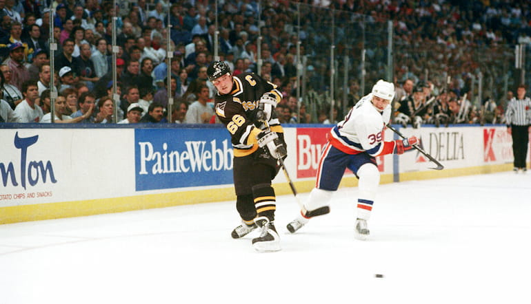 Mario Lemieux shoots for Pittsburgh Penguins